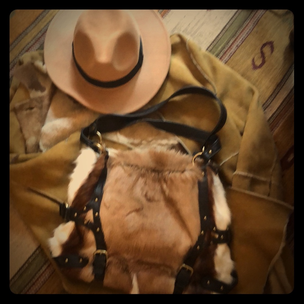 Multi-toned cow hide bag stands out w Blk trim